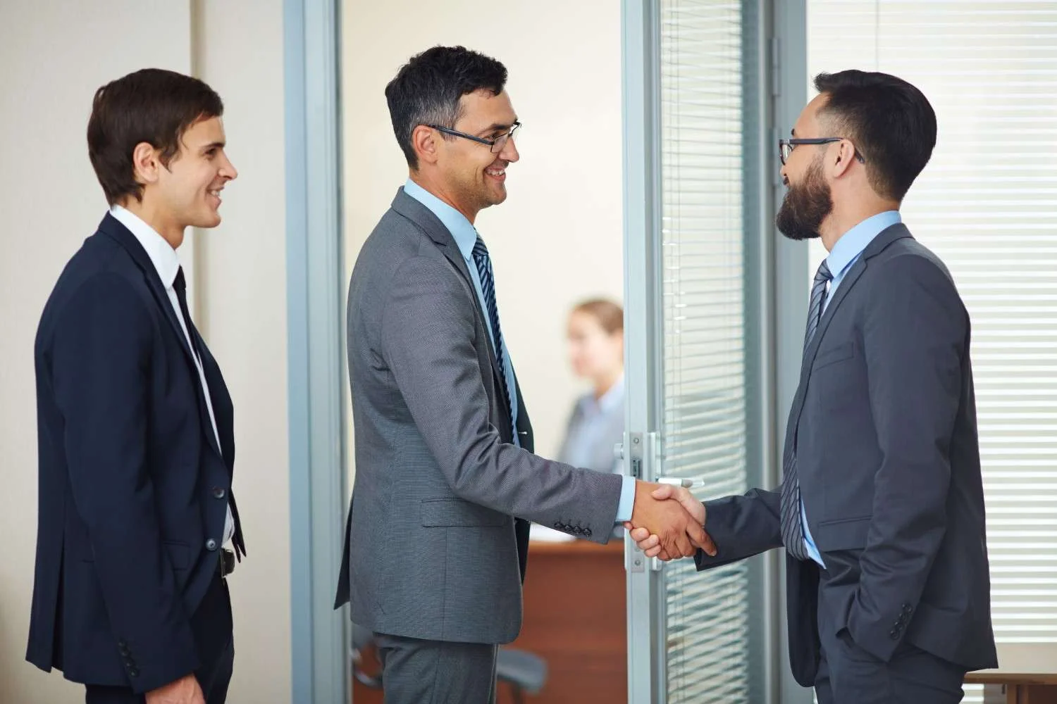 Handshake between satisfied candidates and employers, representing quality hiring and strong job matches